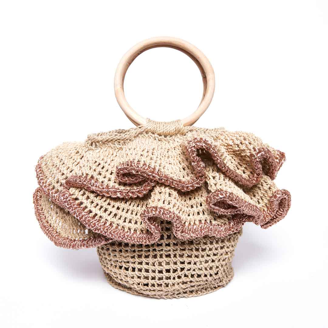 Back of ripple basket woven basket with woven ruffles with rose gold metallic trims.