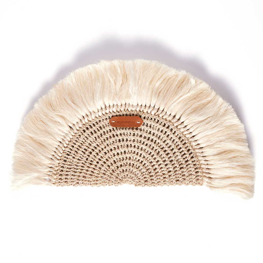 Sing Sing natural tassel and handwoven half moon clutch bag