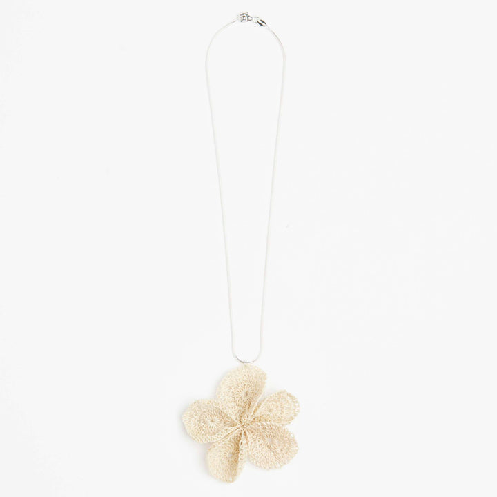 Silver and natural woven flower necklace on white background #Silver