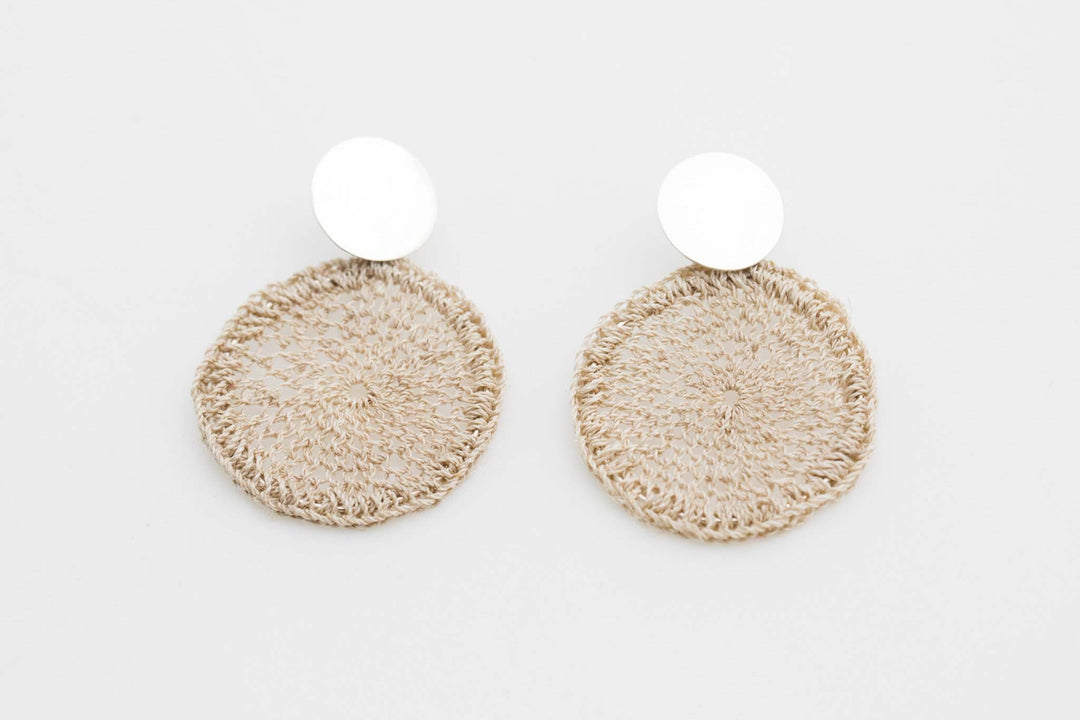 Bilum and Bilas silver disc earrings with handwoven natural fibre large disc